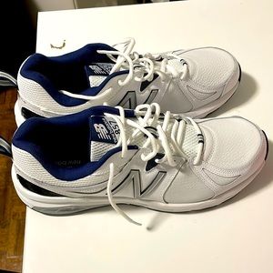 New balance 857! Never worn outside and it comes with the pack